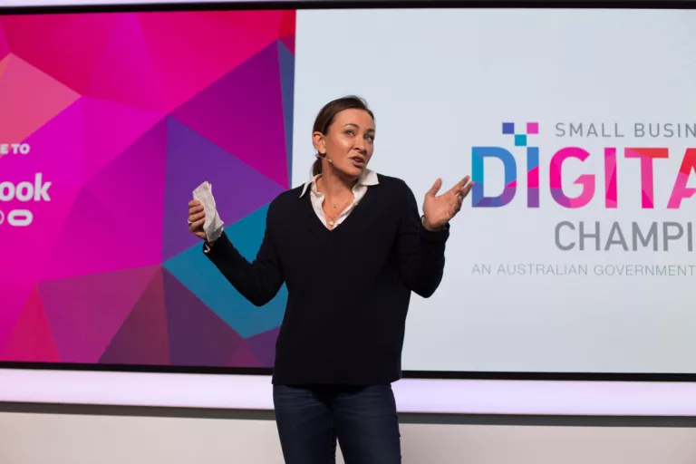Presenter at Facebook seminar addressing audience at small business digital champion event