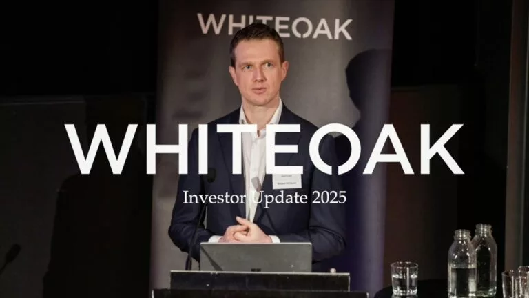 Whiteoak Investor Update 2025 corporate presentation cover with speaker at podium